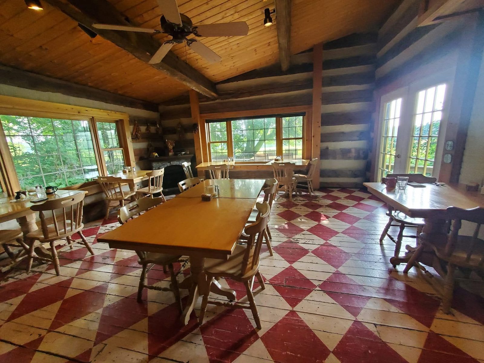 Tables set in the Dining House at Murphin Ridge Inn