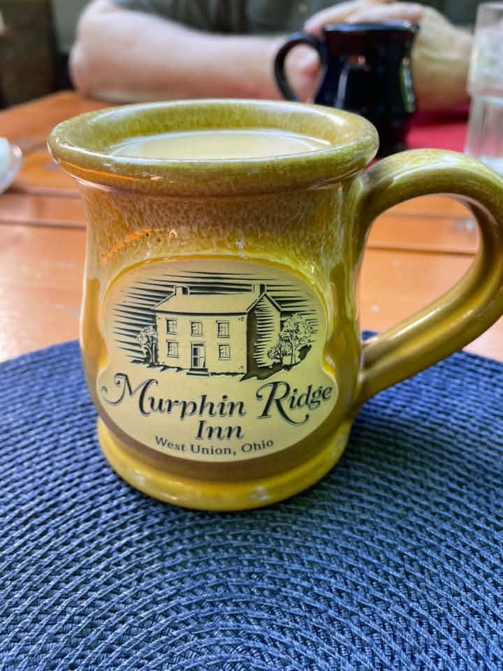 A Murphin Ridge coffee mug on a quiet morning